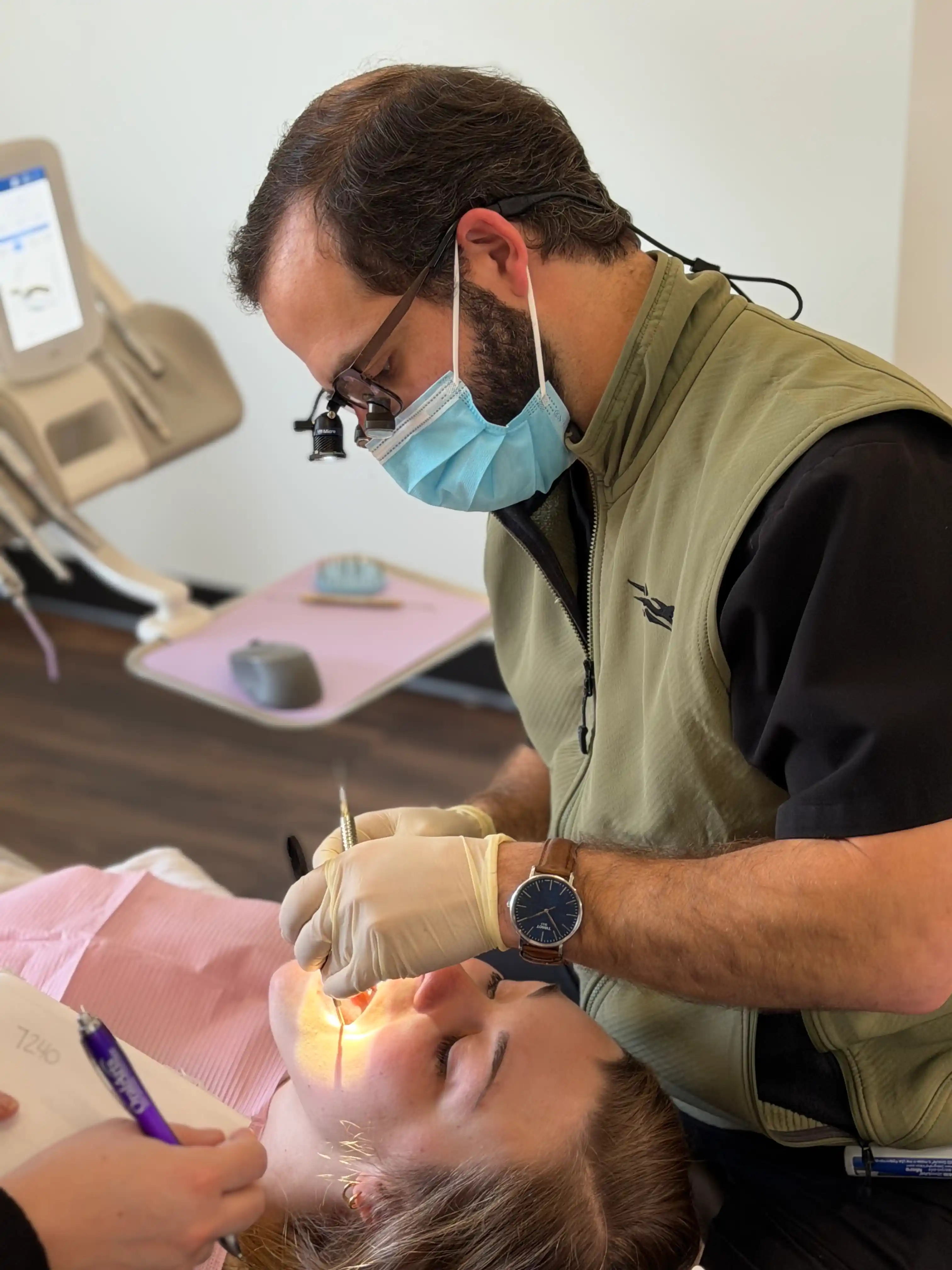 Dr. Sean Fitzhugh providing emergency dental treatment to a patient at Harrison Family Dentistry in Chattanooga TN